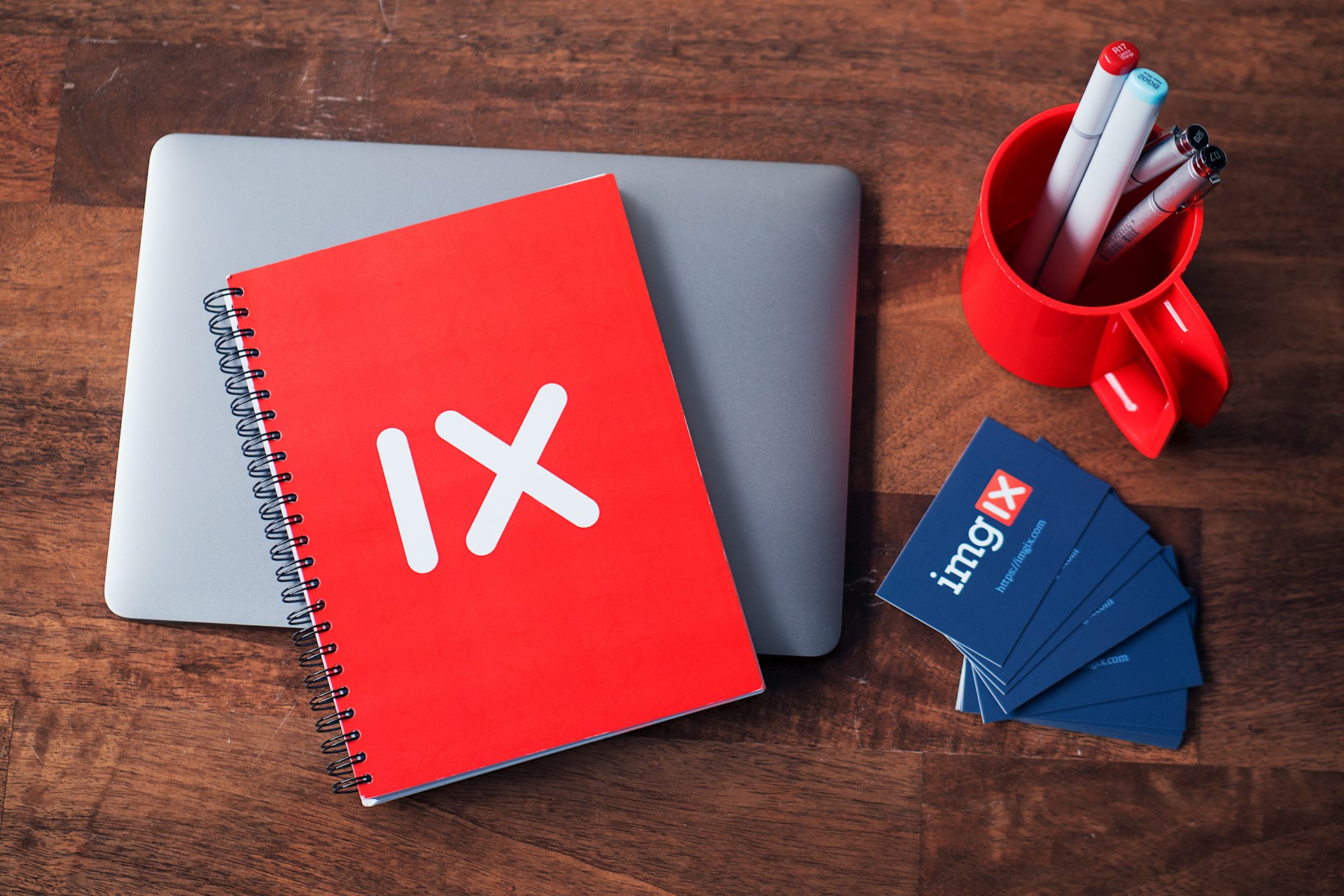 red spiral notebook in flat lay photography